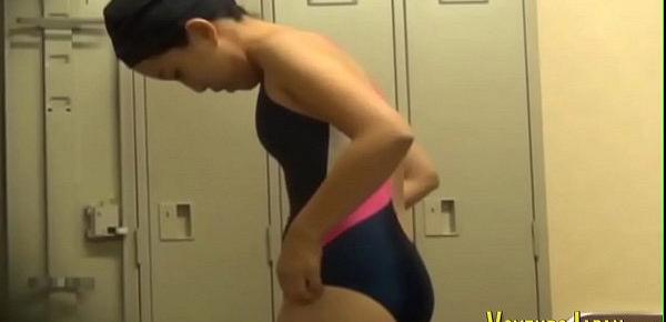  Asians in locker room change into swimsuits